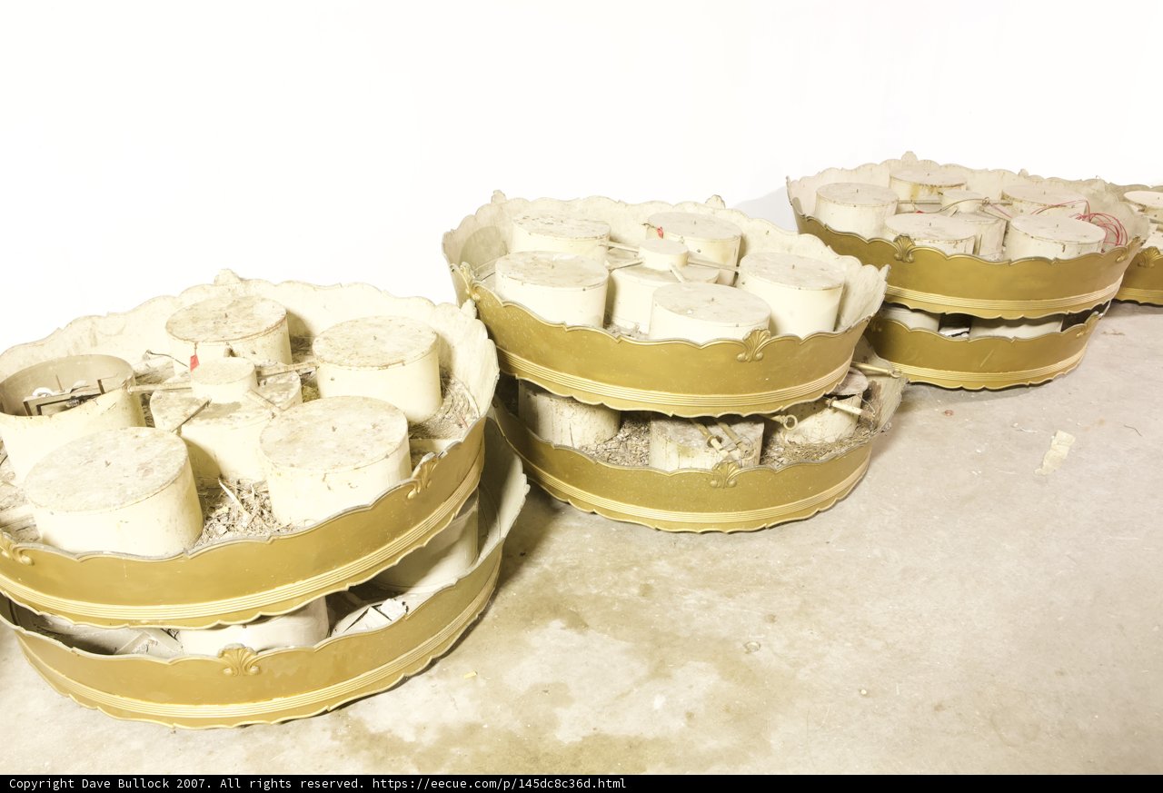 White and Gold Containers on Display
