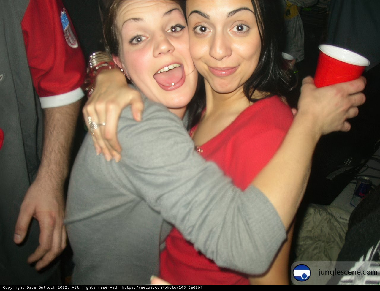 Hugging Over Red Cups