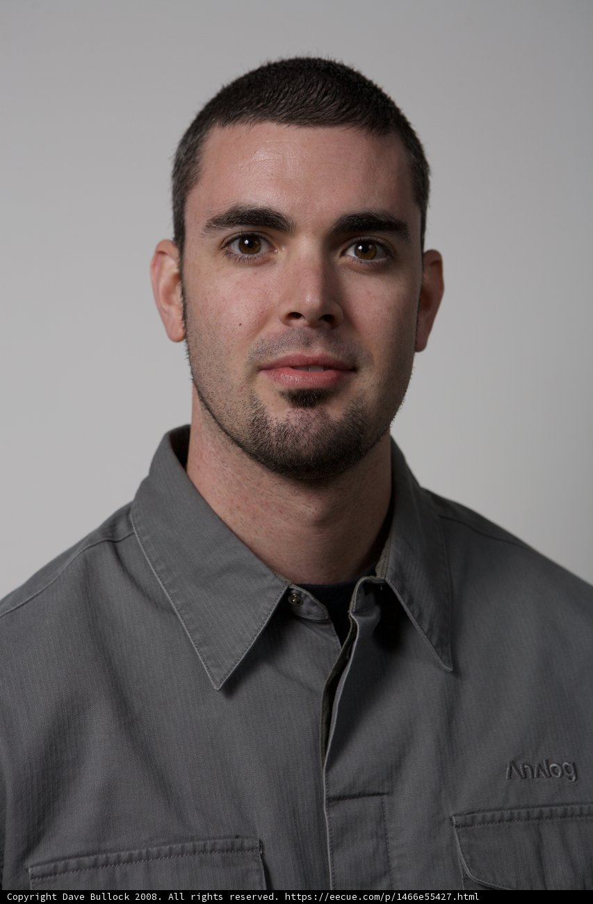 Portrait of Dan B in Gray Shirt and Jacket