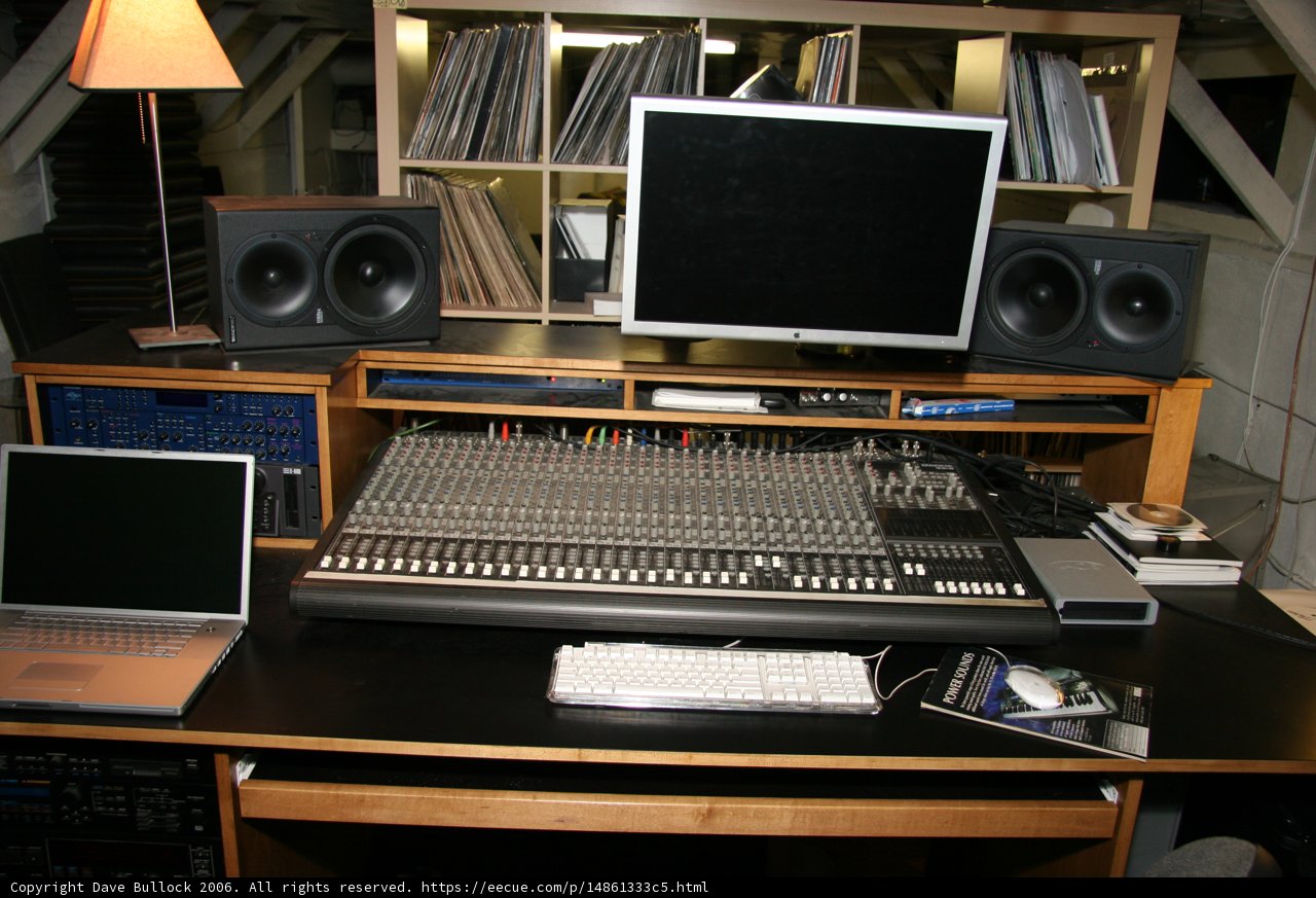 Black Desk with Electronics and Speakers