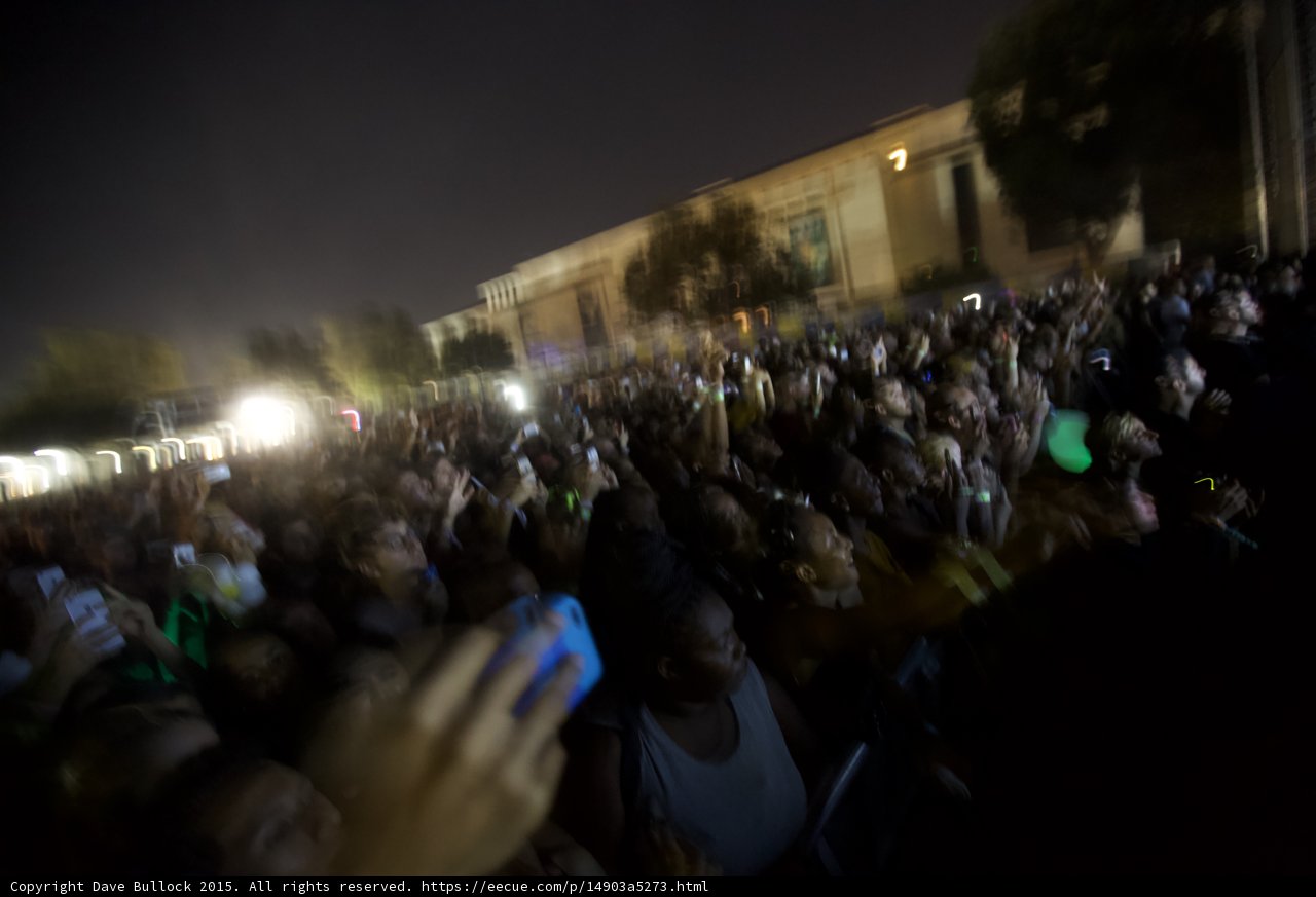 FYF Fest Massive Crowd Night Phones Raised Stage Lights Building Green Glow Stick