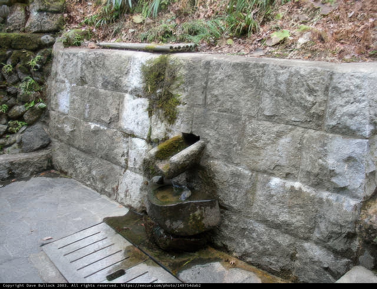 The Serene Stone Wall and Water Fountain