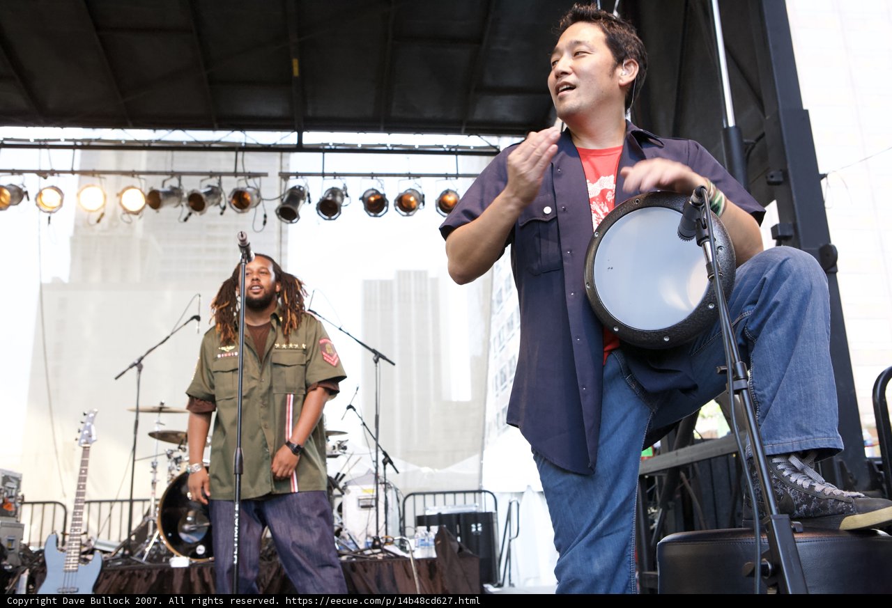 Sho Nakata playing the drums at the Grand Performances Ozomatli concert