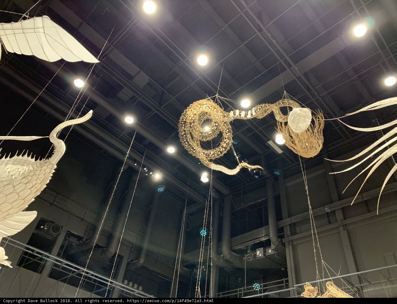 Hanging Sculptures in a Spacious Room