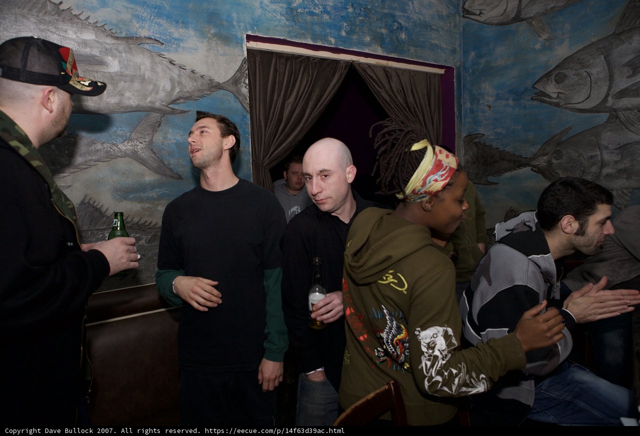 Group of Friends Enjoy Drinks and Art at Local Pub