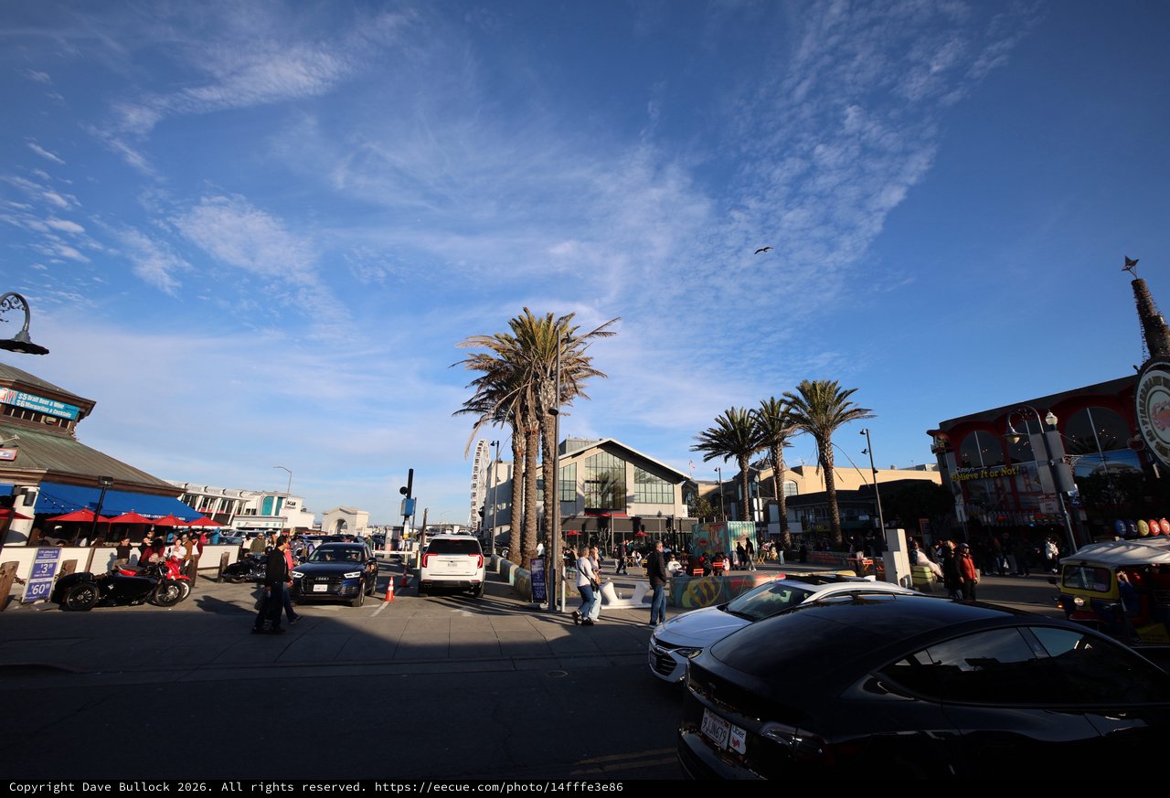 Bustling Coastal Shopping District at Golden Hour