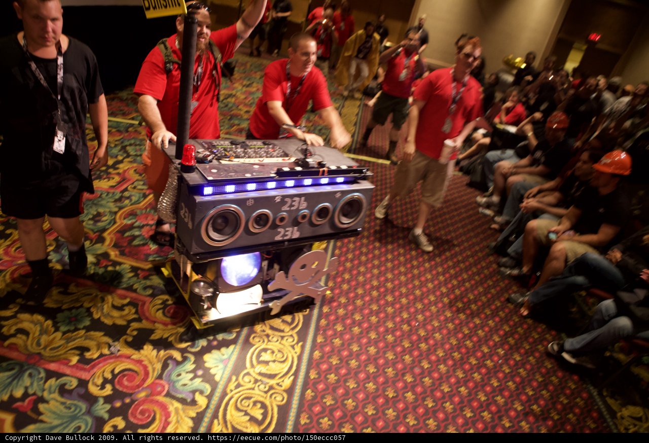 Party People Surrounding the Enormous Speaker