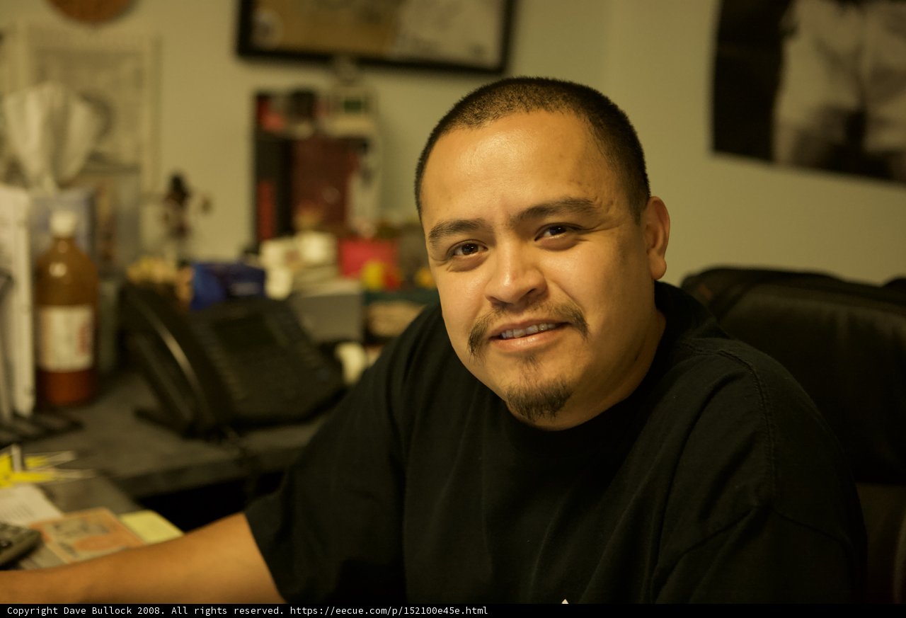 Black Shirt at the Desk