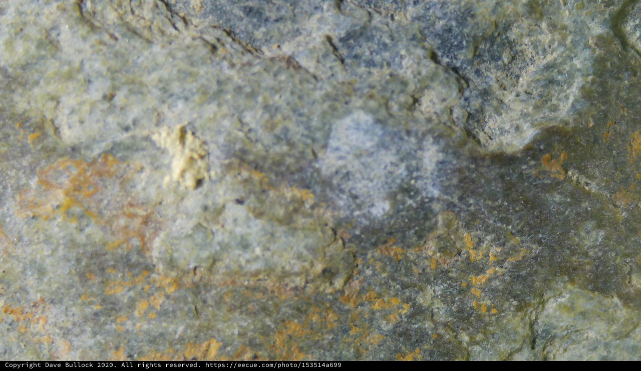 Macro Close-Up of Mineral-Rich Rock Surface