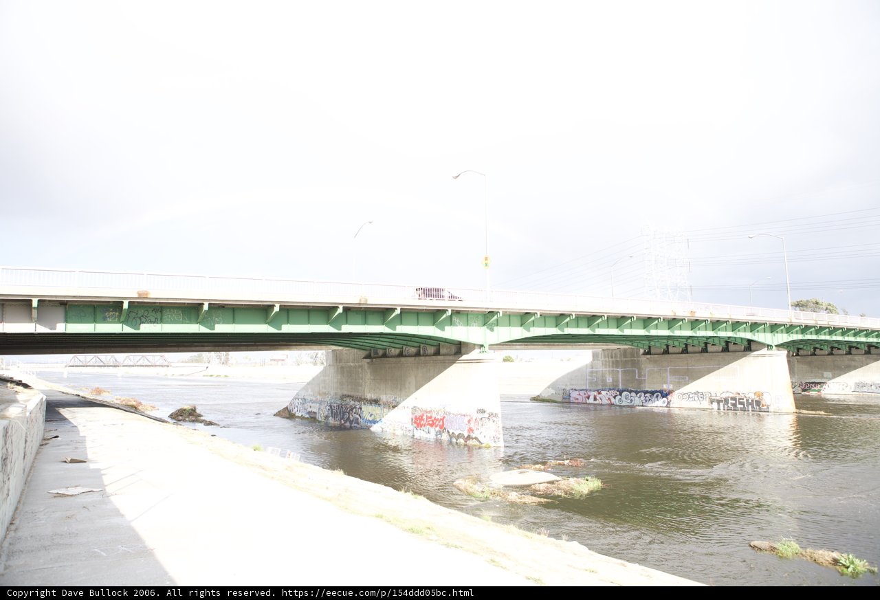 Rainbow Over Arch Bridge