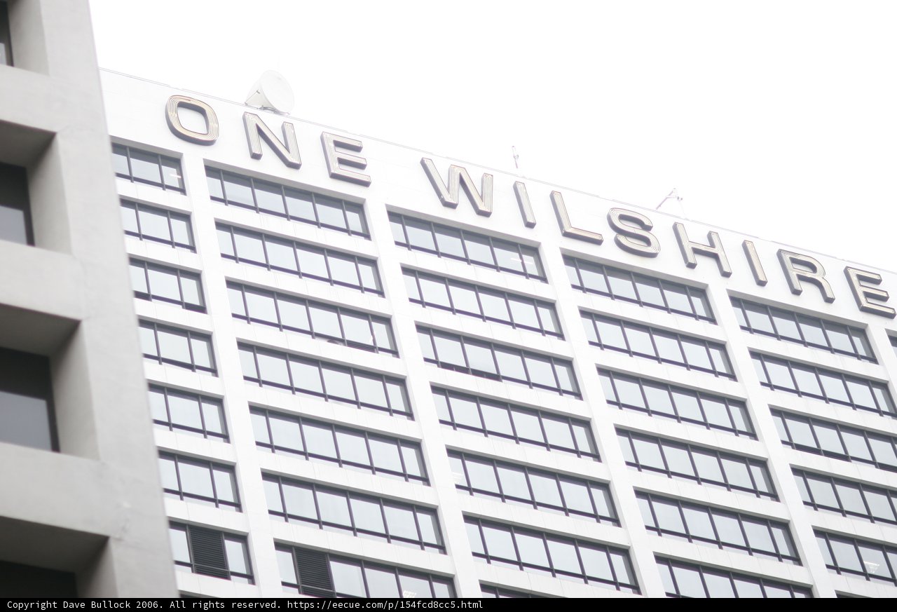Clock-topped High Rise Building in the City