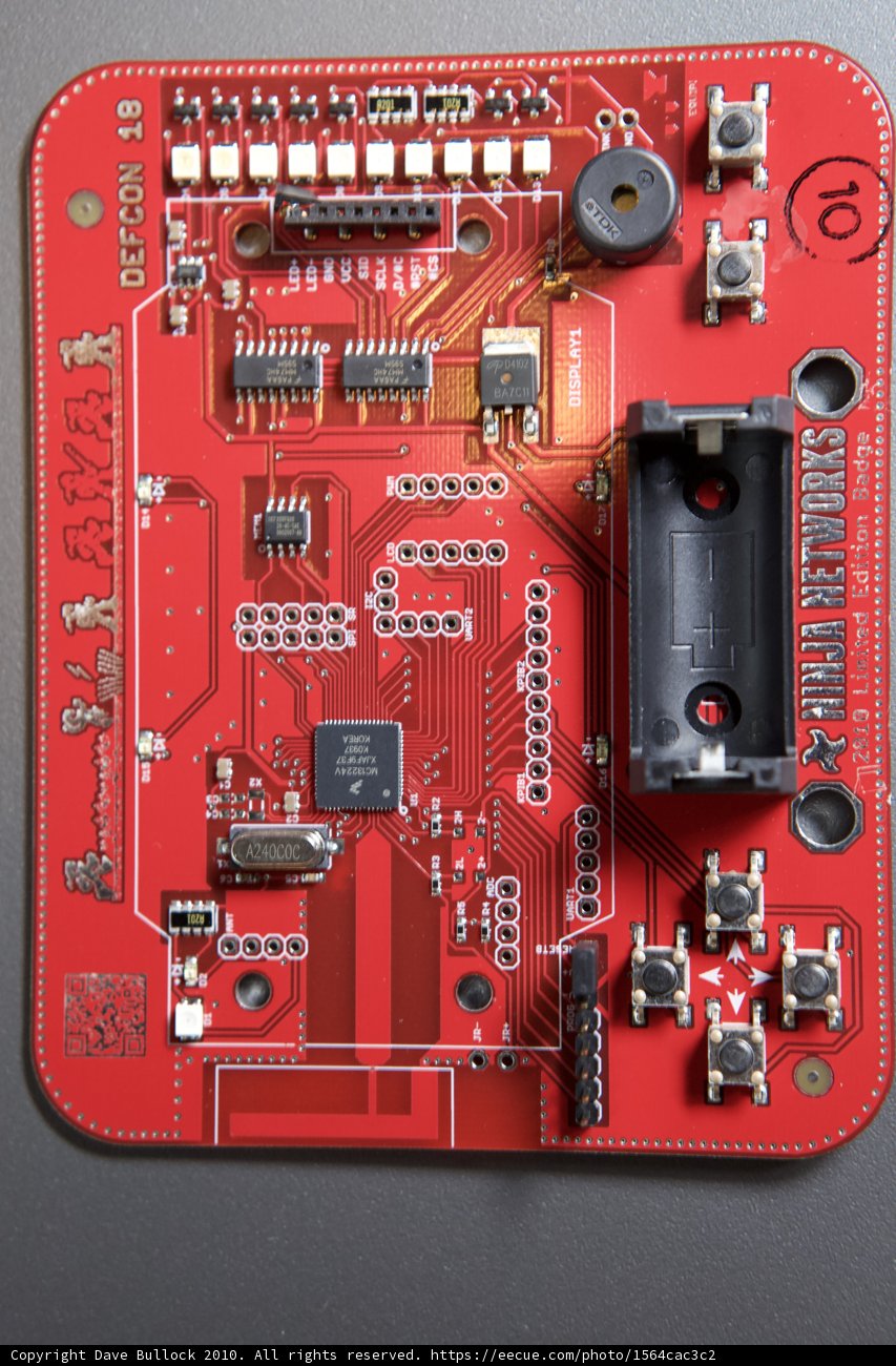 Red Circuit Board with Electronic Device Attached