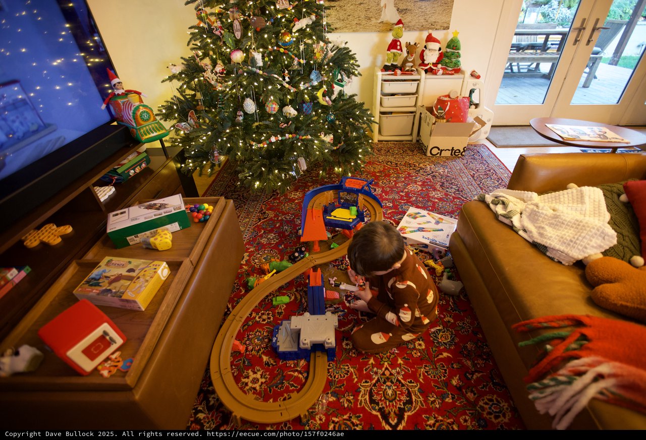 Child Playing with Train Set on Christmas Morning