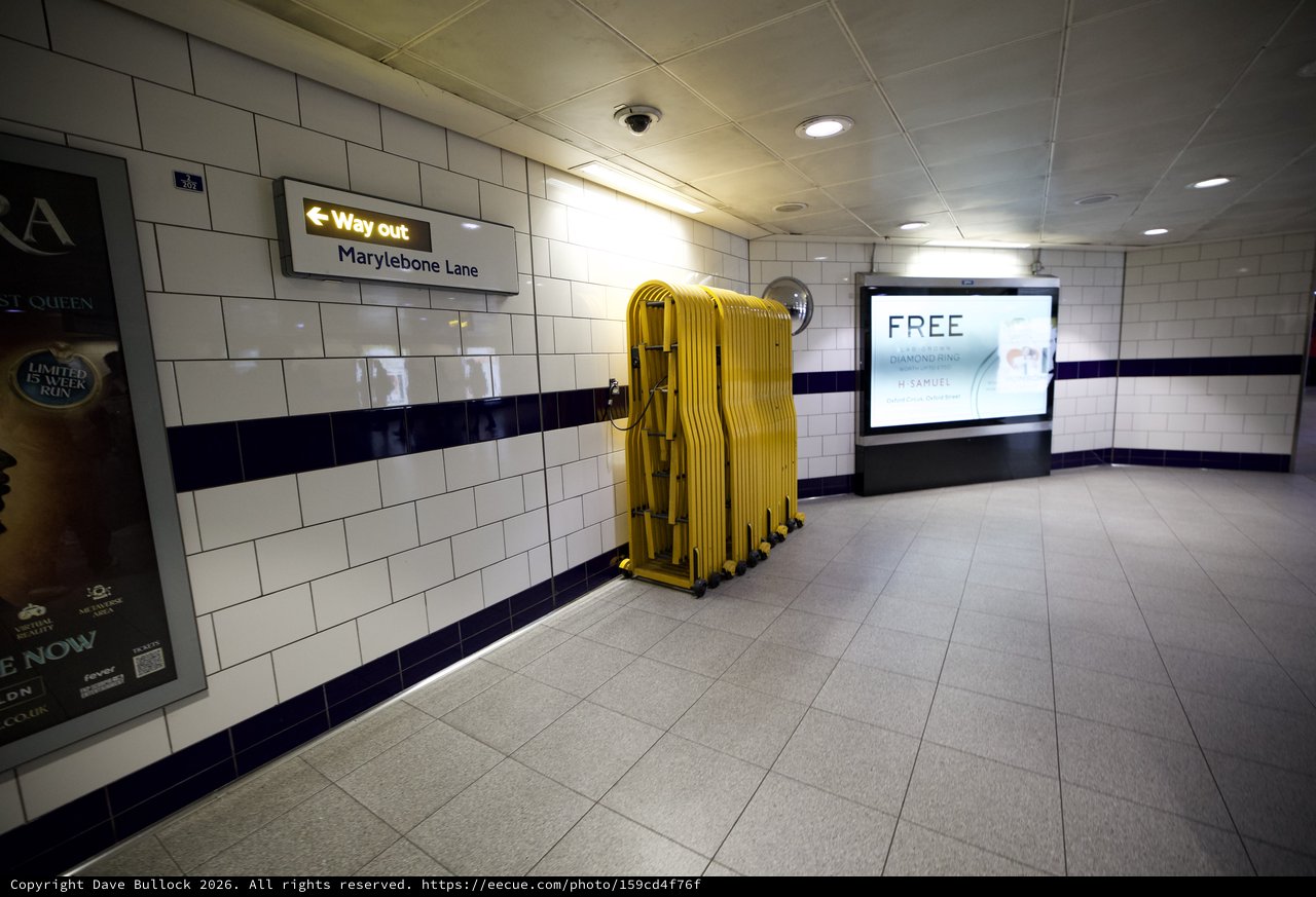 Yellow Safety Barriers at Marylebone Lane Underground Station Exit