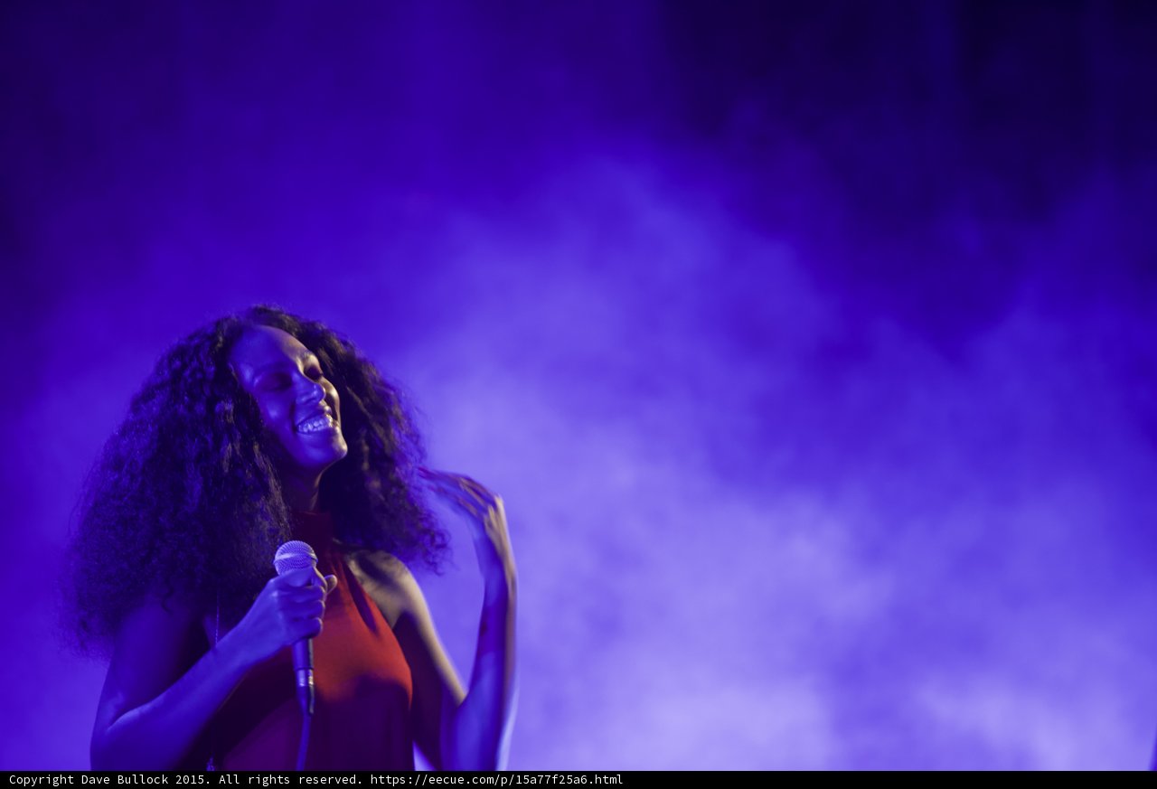 Solange Portrait Smiling Eyes Closed Head Back Blissful Purple