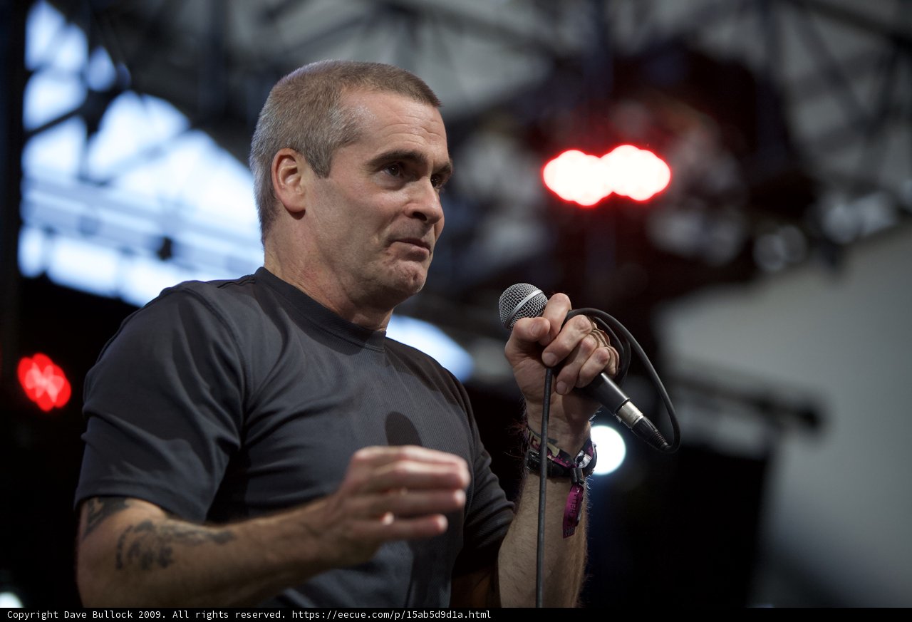 Henry Rollins Takes the Stage with Tattoos and a Mic