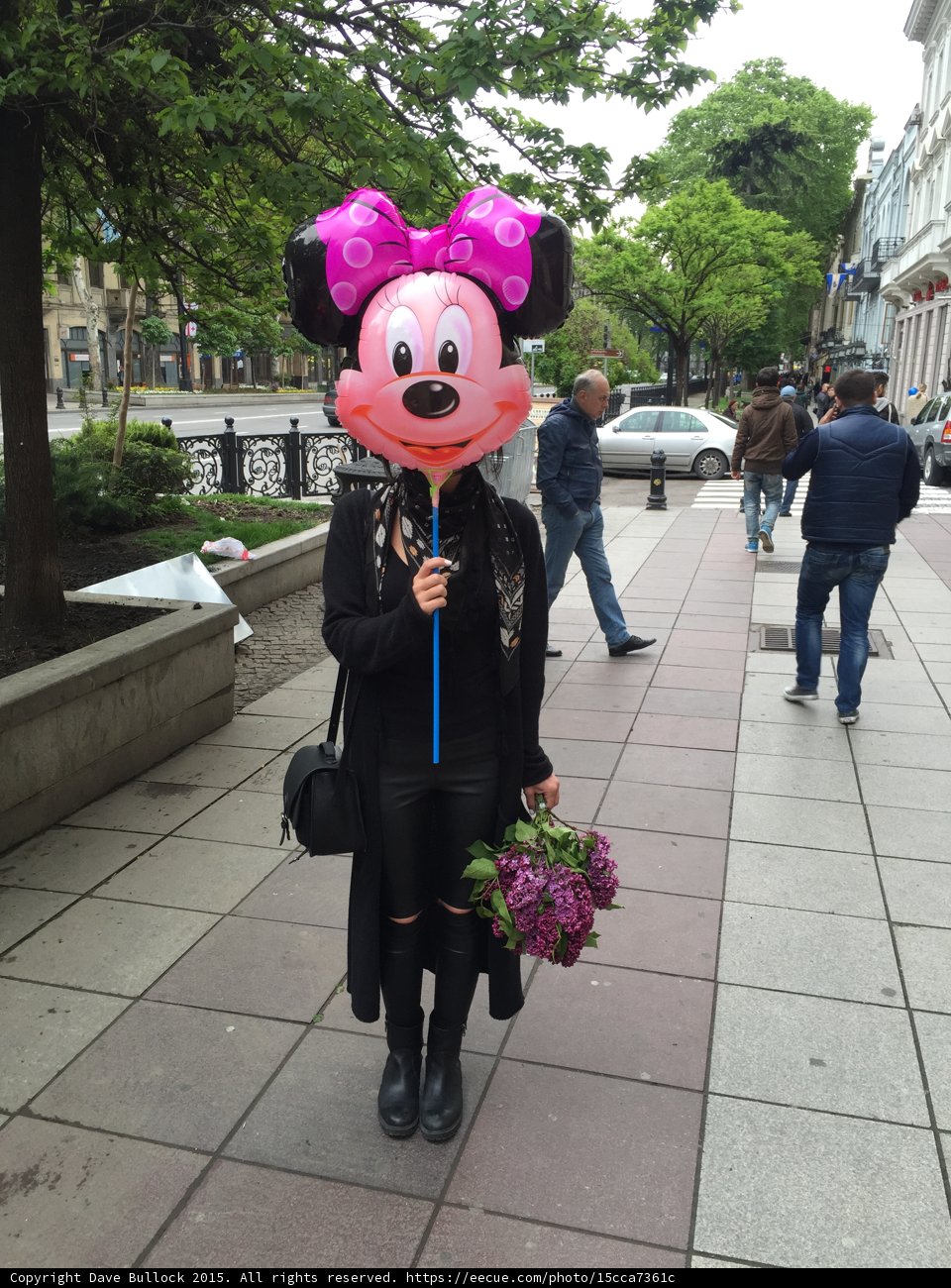 Woman with Minnie Mouse Balloon