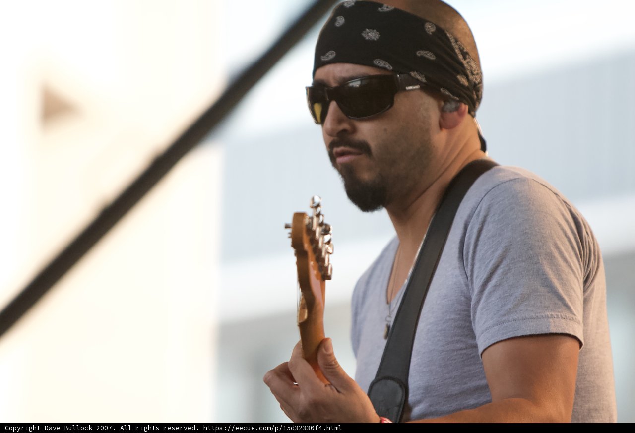 Bandana-Clad Musician Rocks Out on Stage