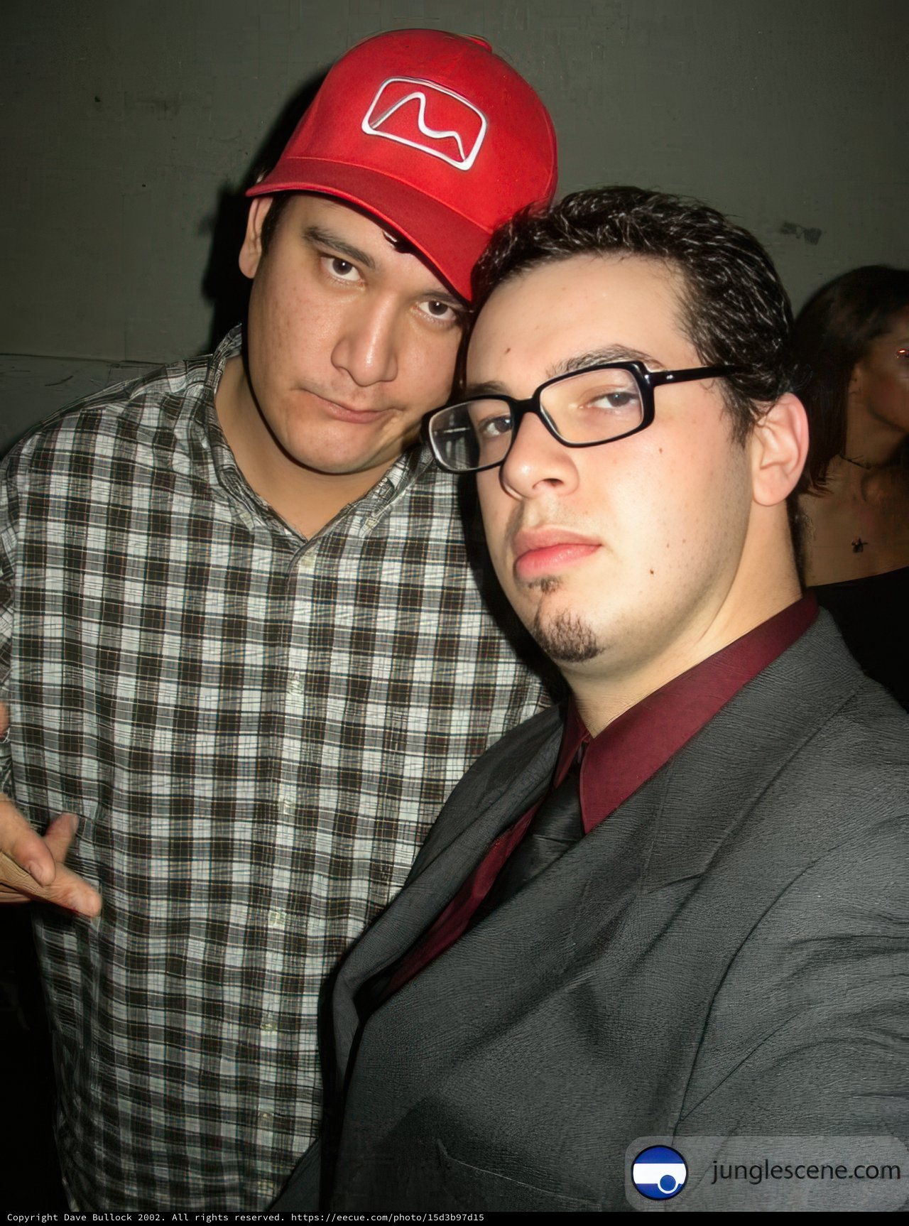Two Men Strike a Pose for a Picture