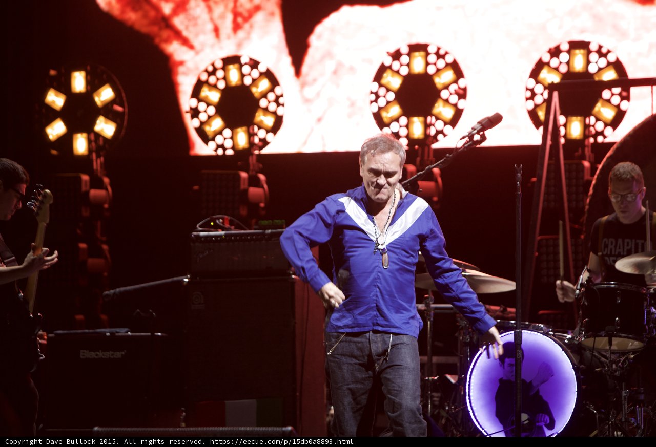 Morrissey Hands On Hips Blue Shirt Guitarist Drummer Gold Lights Red Video Screen LED Drum