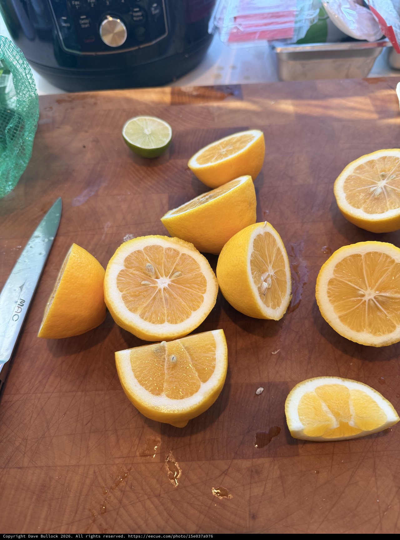 Freshly Cut Citrus Fruits on Wooden Cutting Board