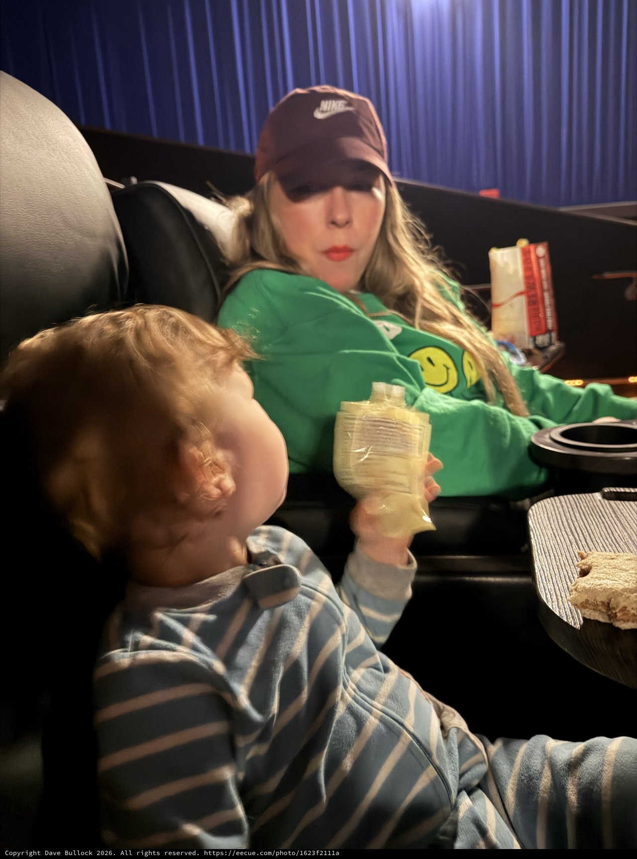 Cozy Movie Night: Mother and Child Relaxing Together