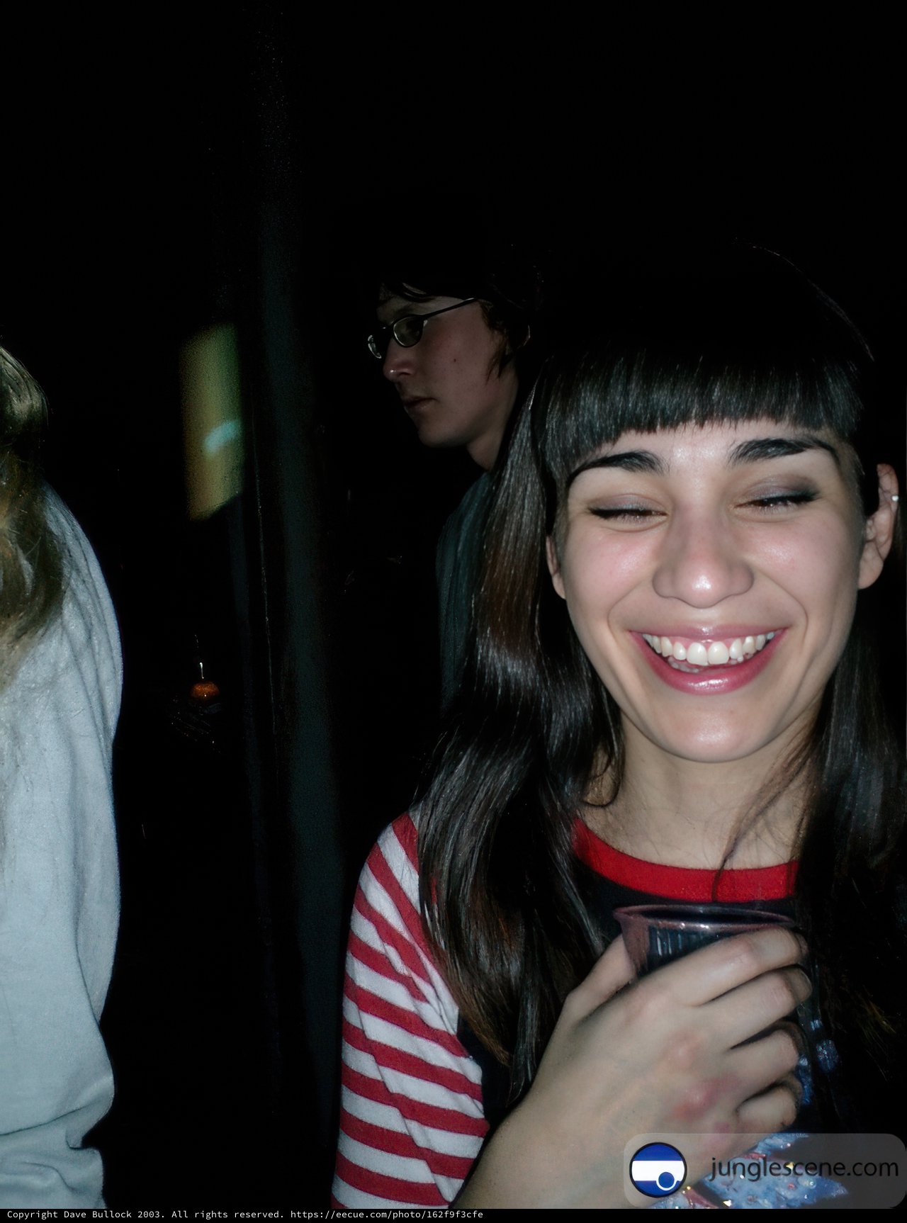 Smiling Woman Enjoying a Night Out