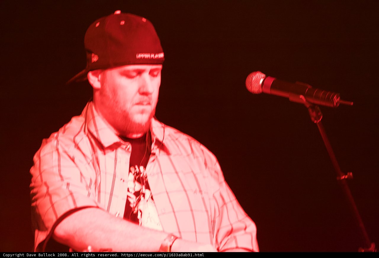 Baseball Cap-wearing Singer Performs at 2008 Coachella Music Festival