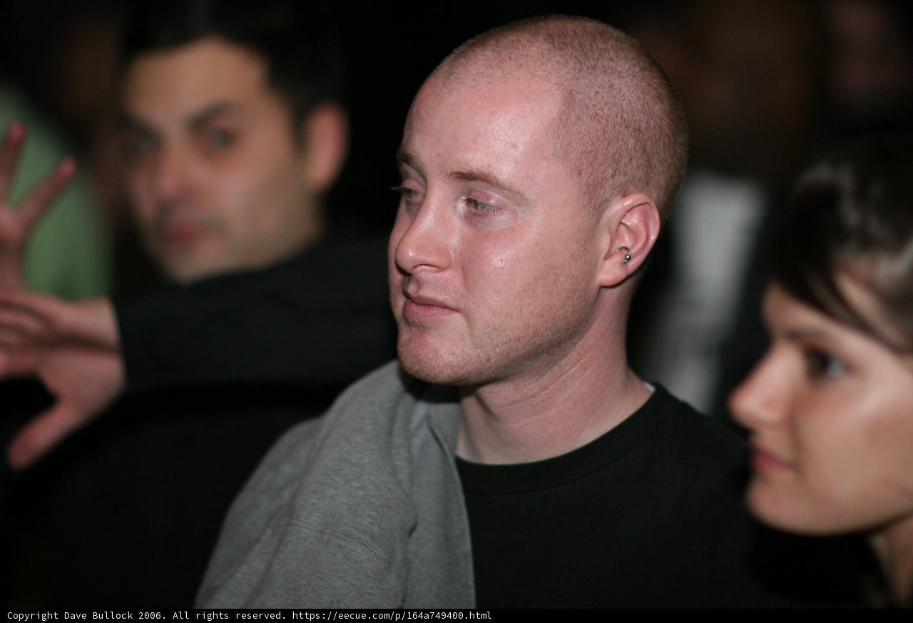 Bald-headed Michael in Black Shirt