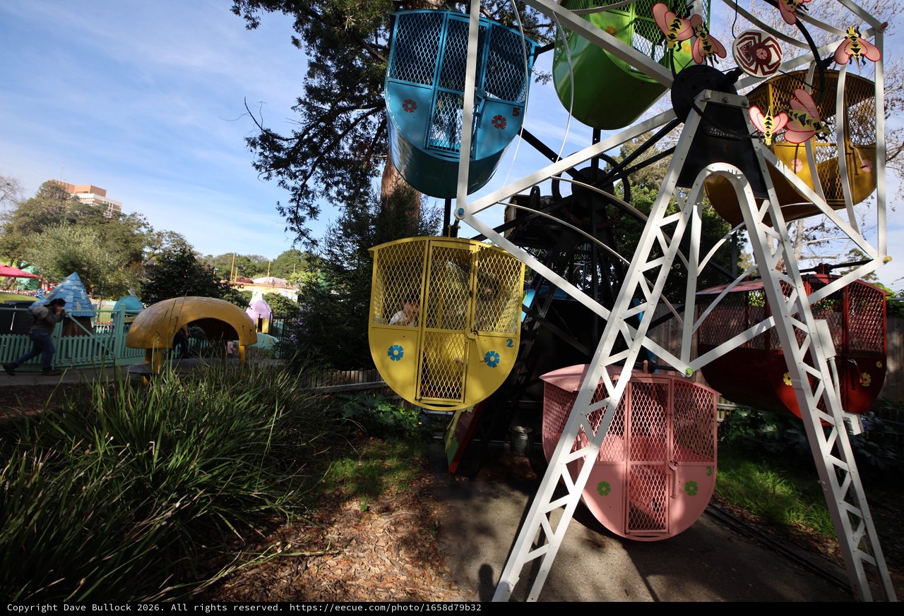 Colorful Ferris Wheel Gondolas at Fantasyland Amusement Park