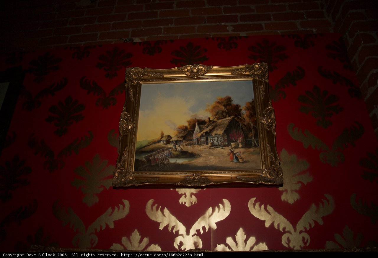 Captivating Village Painting on Red Wall