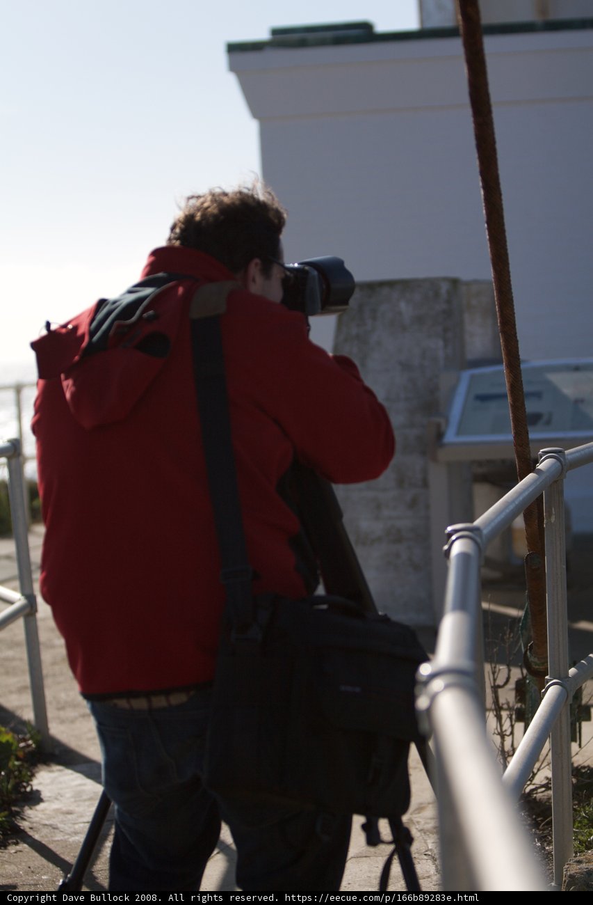 Red Jacketed Man Takes in the San Francisco Skyline
