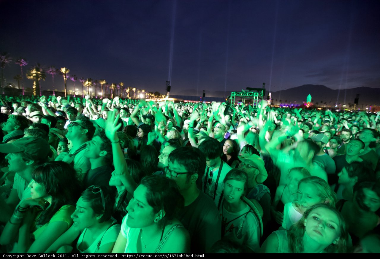 Hands Up in the Urban Night Sky