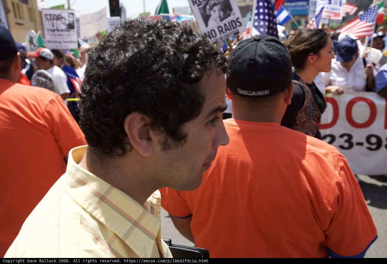 Curly Haired Man Joins the Mayday Rally