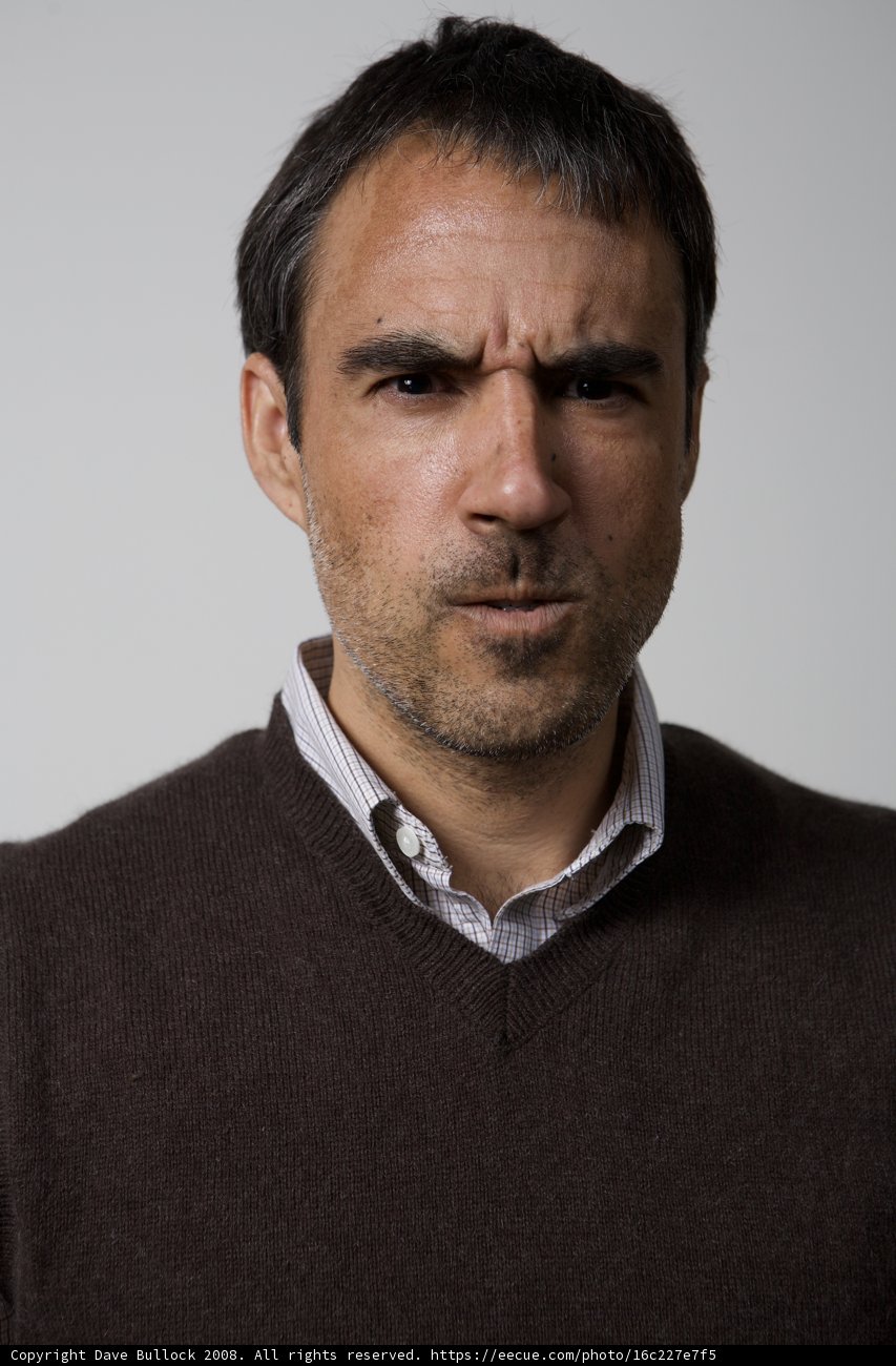Serious Man in a Knit Sweater