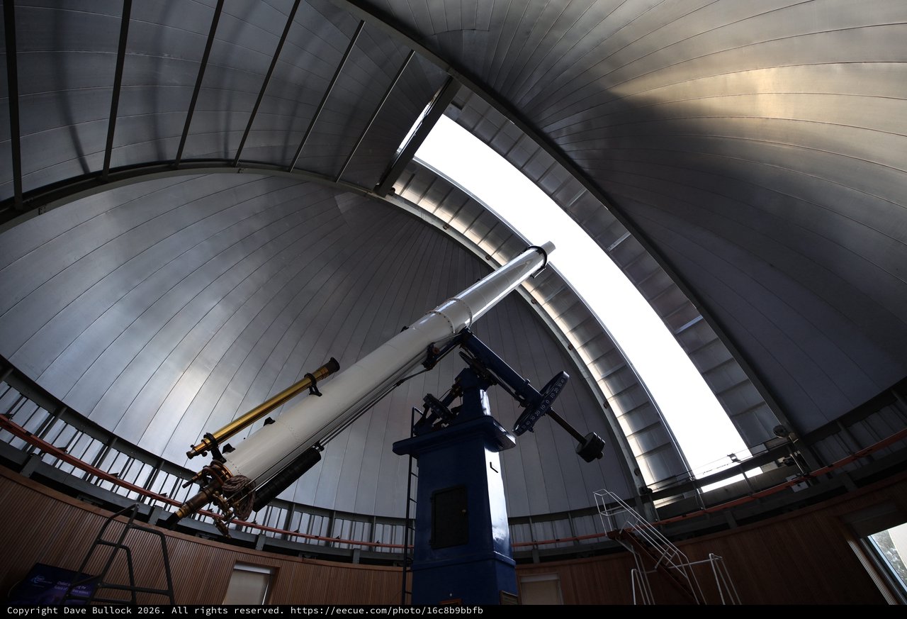 Historic Telescope Under Observatory Dome Architecture