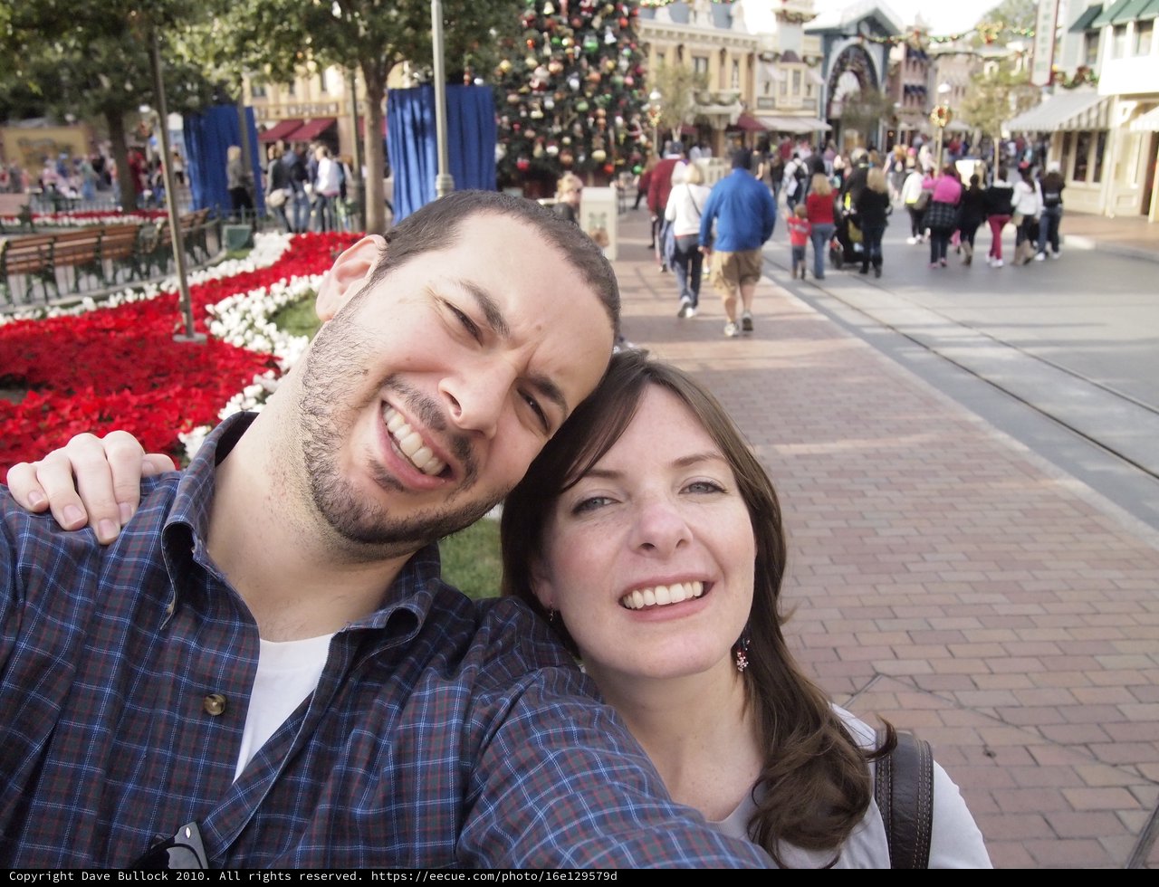 Couple's Joyful Selfie on Disneyland's Main Street USA