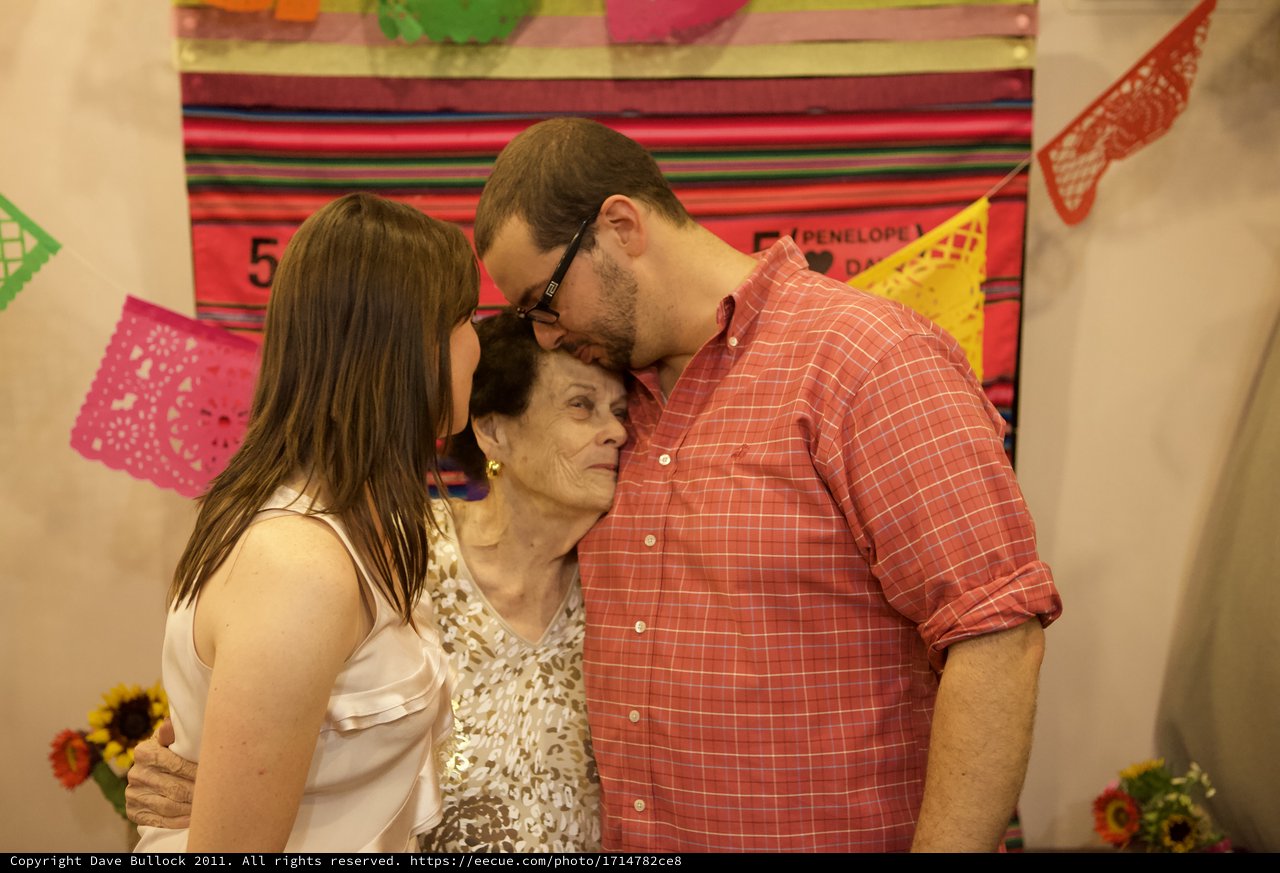 Three Generations Share a Tender Moment of Love