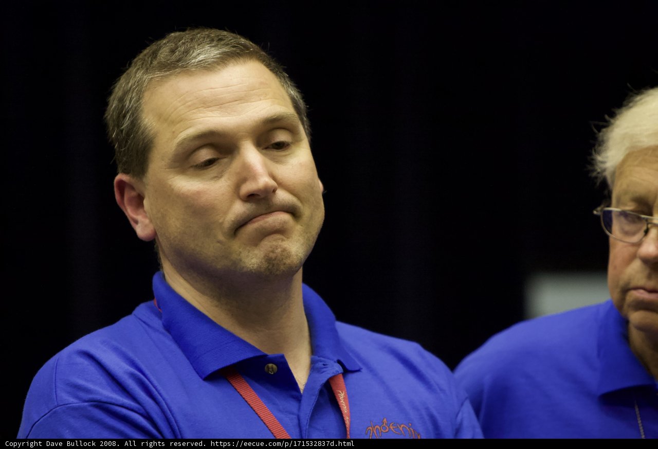 Two Men in Blue Shirts