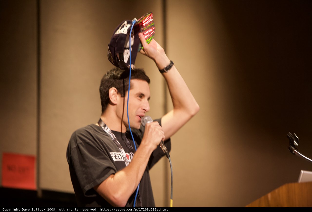 Microphone in Hand, Hat on Head