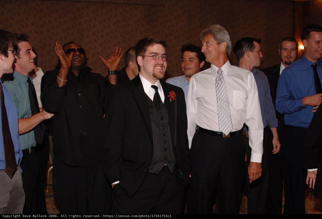 Groom and Groomsmen Celebrate at Wedding Reception