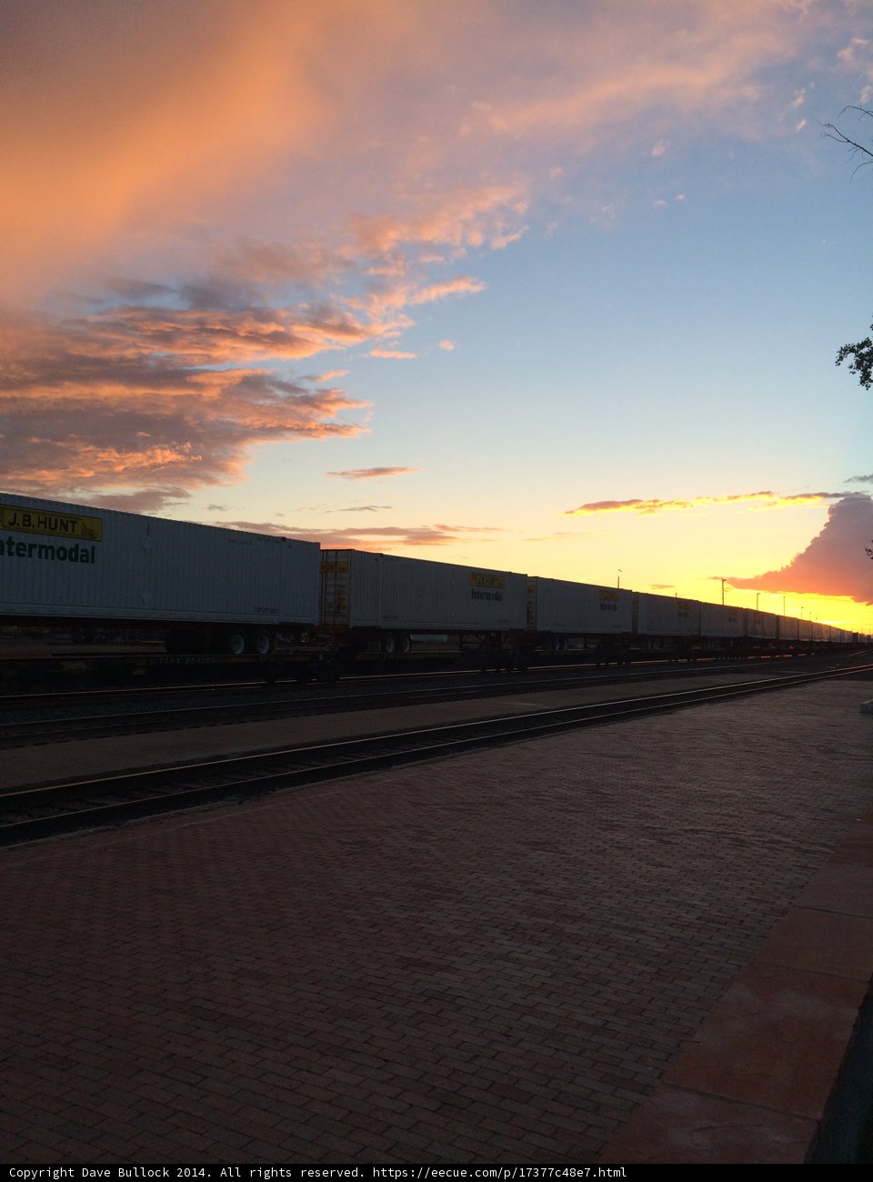 Sunset Train on Railway Tracks