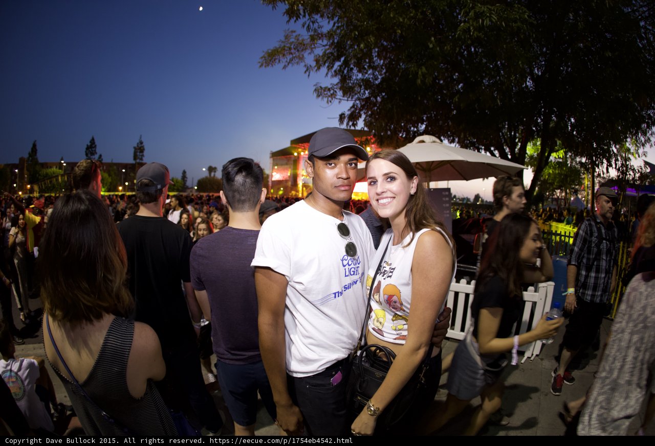 Couple with Moon Visible