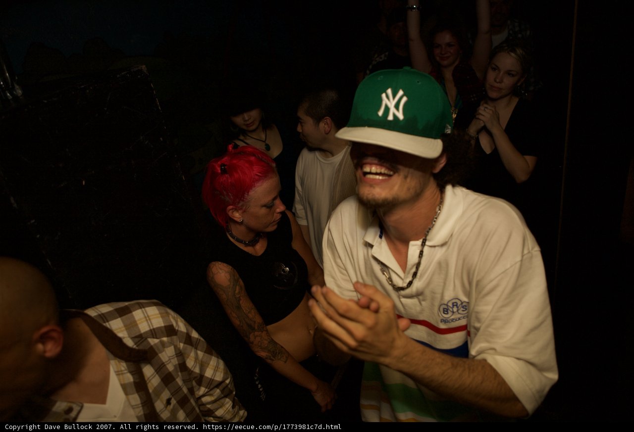 Urban Nightlife with a Pink-haired Beauty and a Hat Wearer