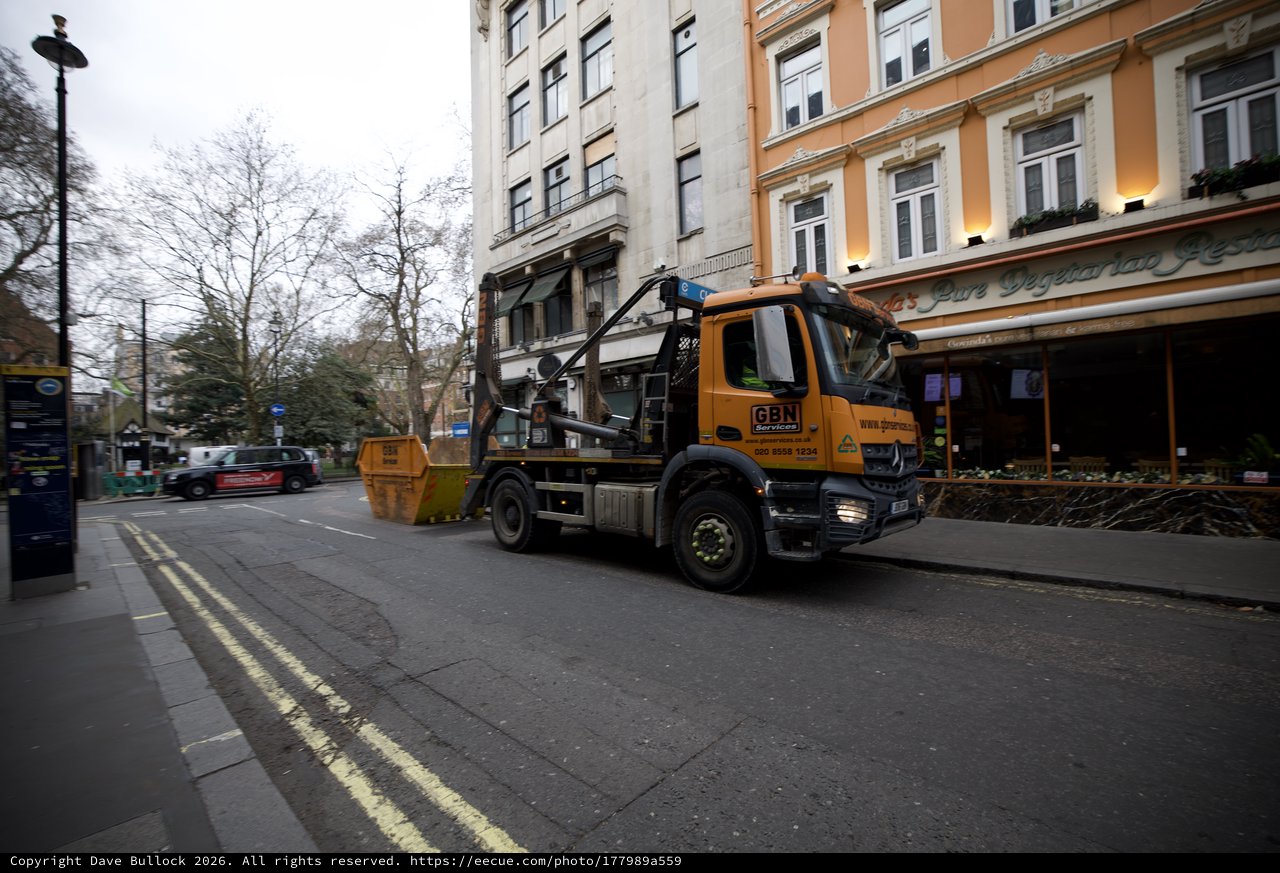 Skip Lorry Making Collection on London Street