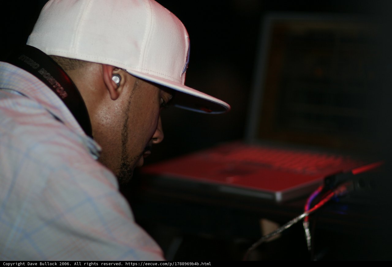Hi-Tech Man with a Cap and Headphones