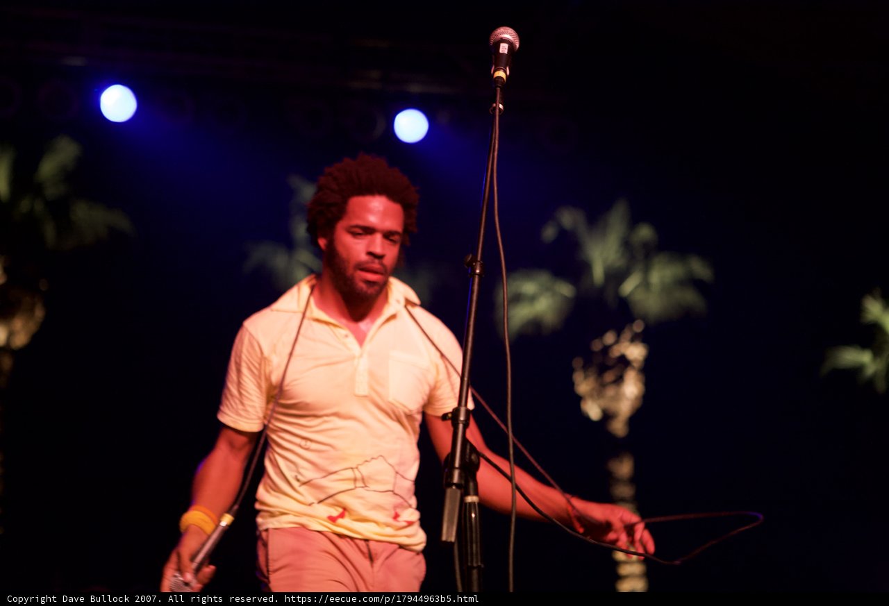 Man Holding Microphone during Live Performance