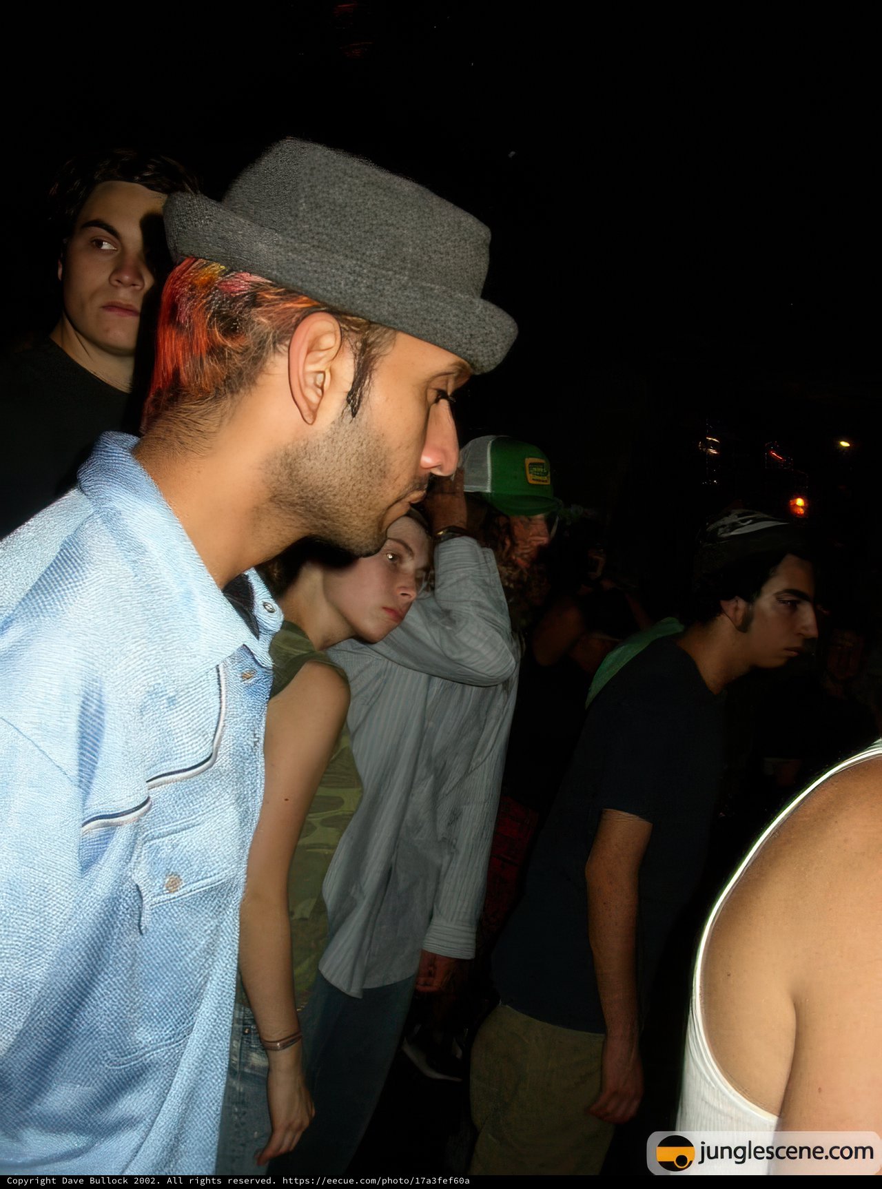 A Fedora in the Urban Night Sky
