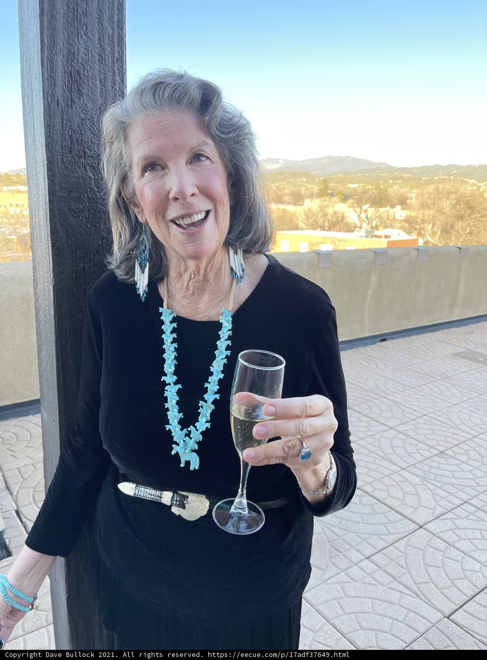 Rhoda B enjoying a glass of wine with a view
