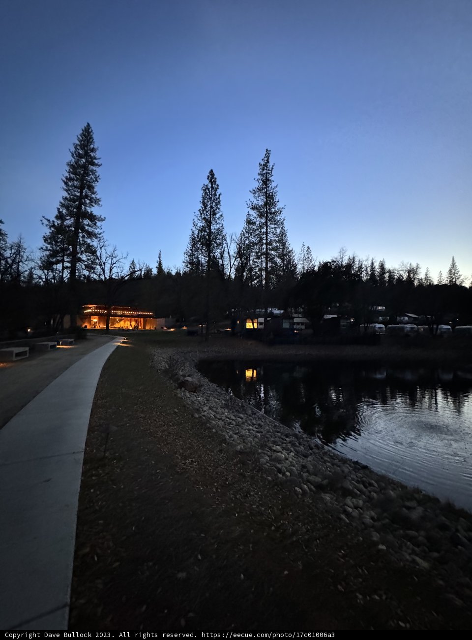 Dusk over the River: A Confluence of Nature and Urbanity
